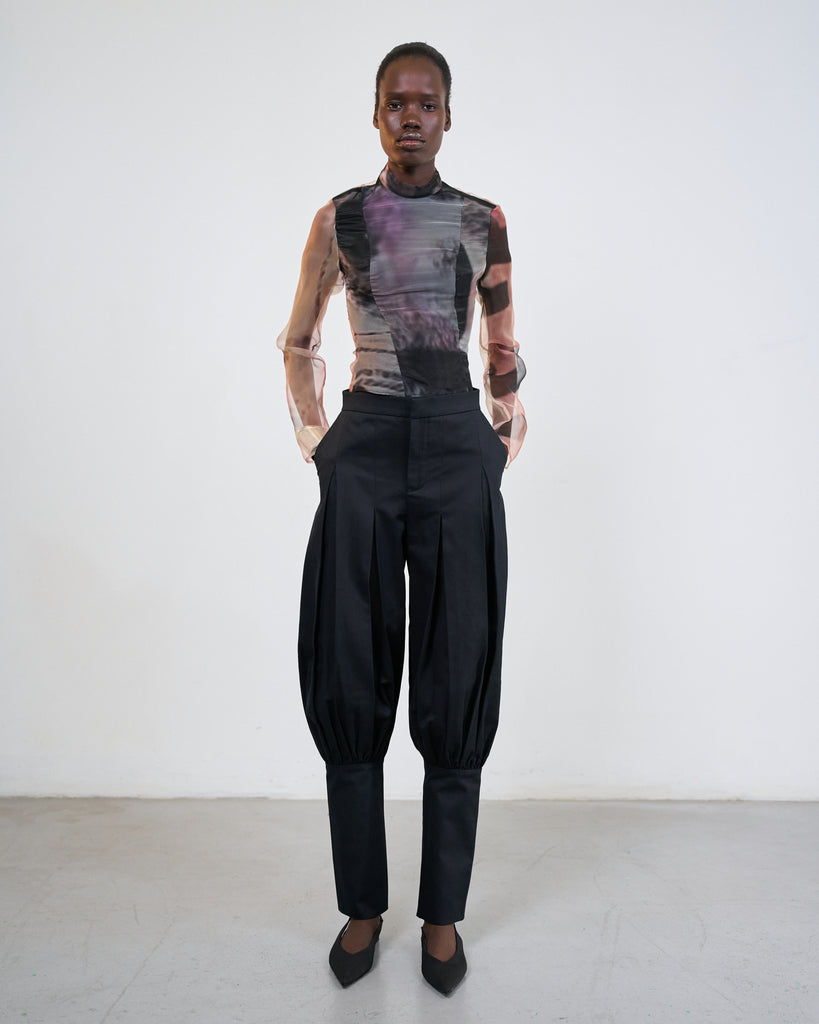 Al Qalam (The Pencil) top