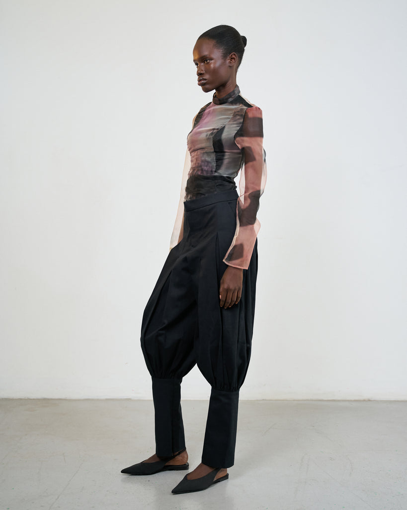 Al Qalam (The Pencil) top