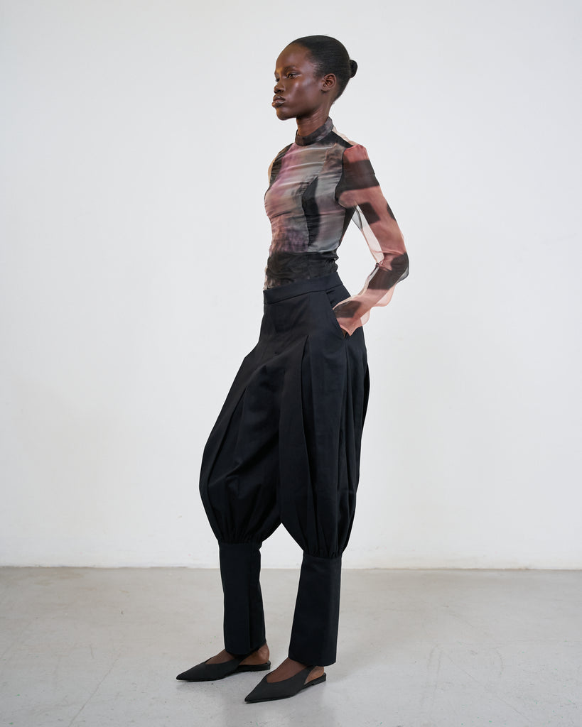 Al Qalam (The Pencil) top