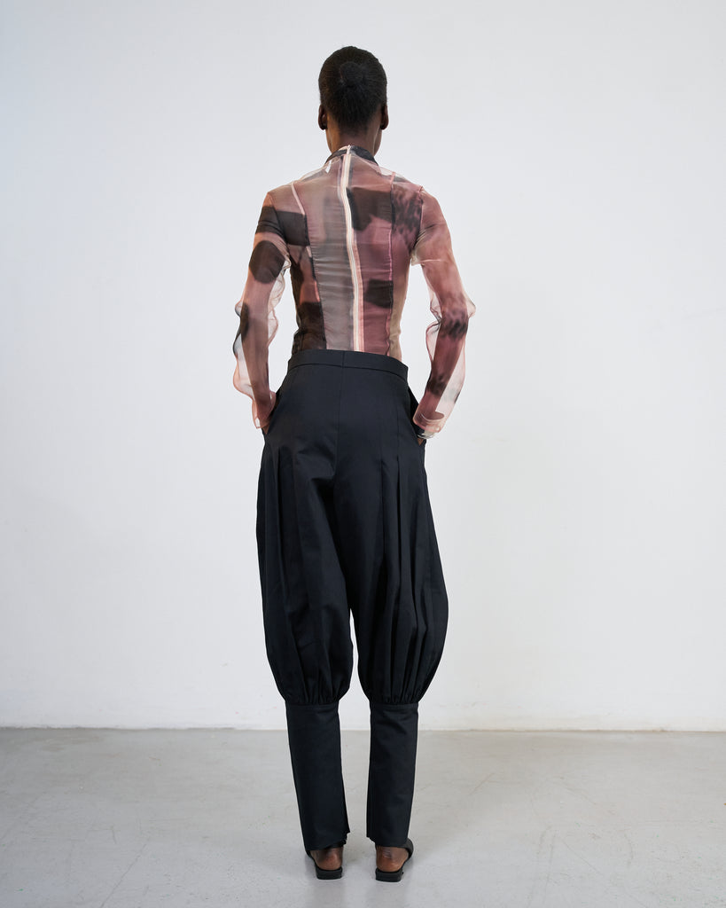 Al Qalam (The Pencil) top